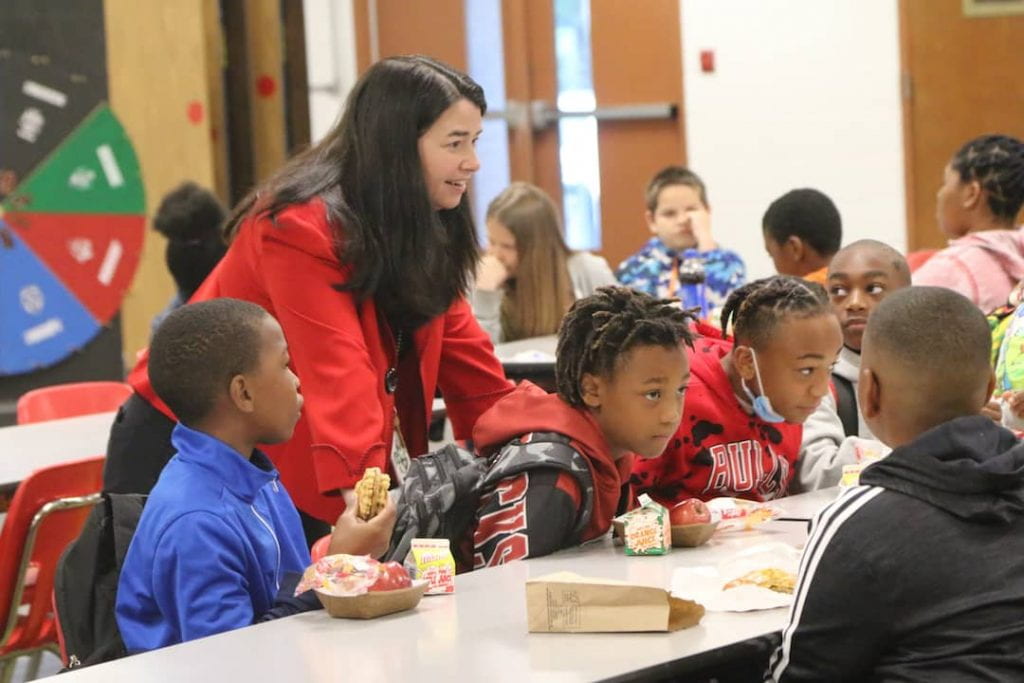 Cindy Bever talks with students in Camden-Fairview School District.