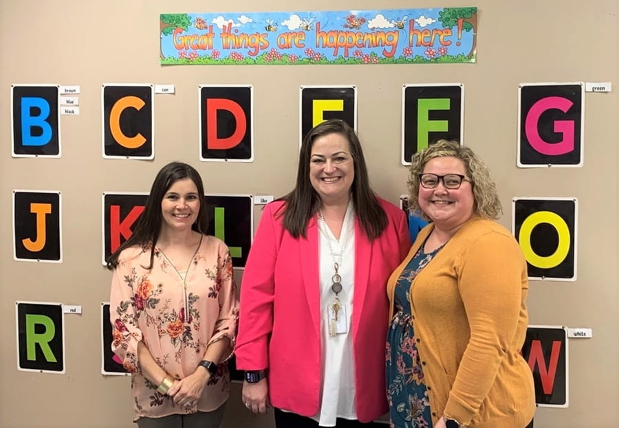 S.C. Tucker Elementary teachers Kimberly Johnston and Lindsey Rylee pose with the school's principal, Jenni Phomsithi. The Danville School District elementary is the first in Arkansas to be led by consecutive IMPACT Arkansas Principal Fellows.